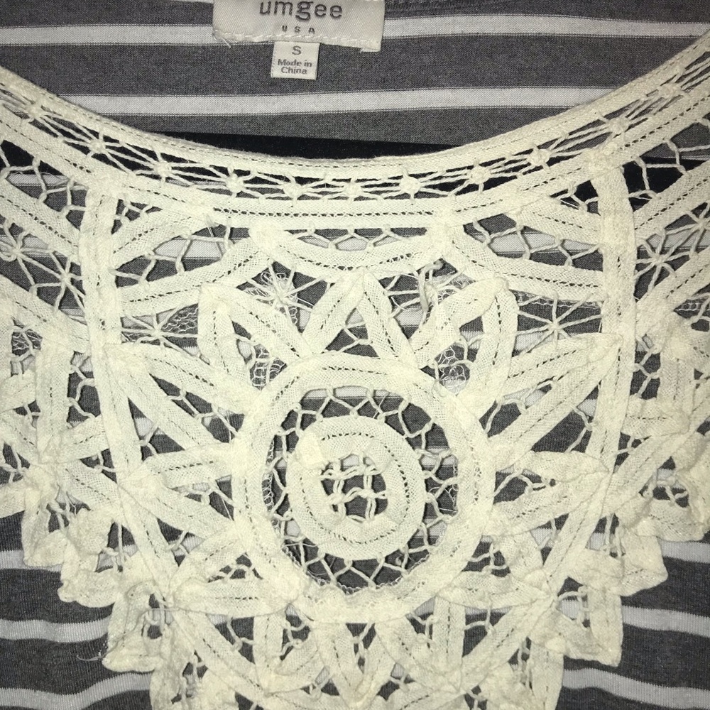 Umgee gray striped top with crocheted detailing.